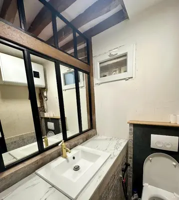 Salle de bains dans l'établissement Appartement cosy