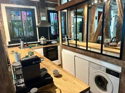 Cuisine ou kitchenette dans l'établissement Appartement cosy