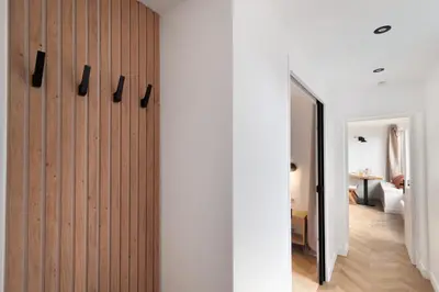 Un ou plusieurs lits dans un hébergement de l'établissement Marais Elegance Suite - 1 Bedroom