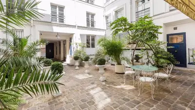 Jardin de l'établissement Orange Vendome - Bright 1-Bed Apt Near the Louvre