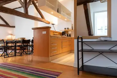 Cuisine ou kitchenette dans l'établissement Orange Vendome - Bright 1-Bed Apt Near the Louvre