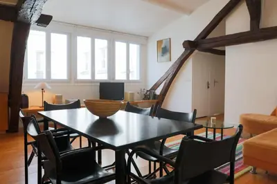 Coin salon dans l'établissement Orange Vendome - Bright 1-Bed Apt Near the Louvre