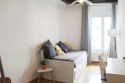 Un ou plusieurs lits dans un hébergement de l'établissement Spacious duplex in the heart of Paris