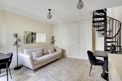 Coin salon dans l'établissement Pick A Flat's Apartment in Monrmartre - Rue Lepic