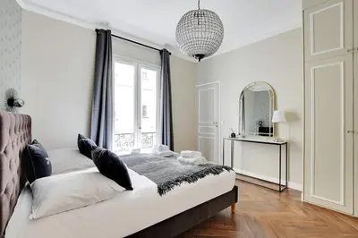 Un ou plusieurs lits dans un hébergement de l'établissement Charming apartment - 1BR-4P - Paris 16