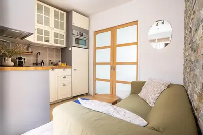 Cuisine ou kitchenette dans l'établissement Appartement lumineux et cosy Gare du Nord - Opéra
