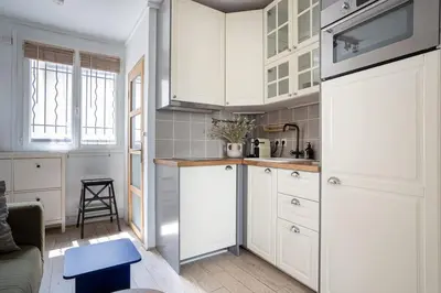 Cuisine ou kitchenette dans l'établissement Appartement lumineux et cosy Gare du Nord - Opéra