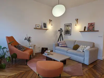 Coin salon dans l'établissement Appartement élégant - Fbg Saint Denis