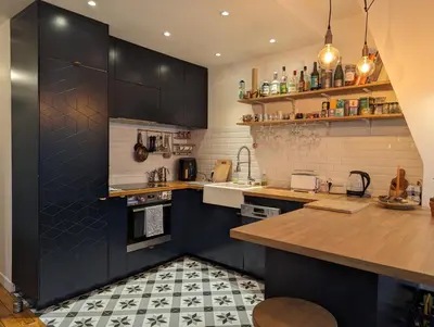Cuisine ou kitchenette dans l'établissement Appartement élégant - Fbg Saint Denis