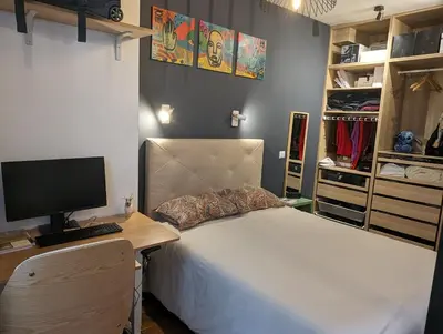 Un ou plusieurs lits dans un hébergement de l'établissement Appartement élégant - Fbg Saint Denis