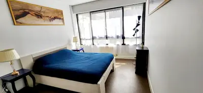 Un ou plusieurs lits dans un hébergement de l'établissement Village Faidherbe Appartement d'Angle Moderne