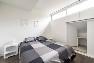 Un ou plusieurs lits dans un hébergement de l'établissement Maison en Centre-Ville - Neuilly