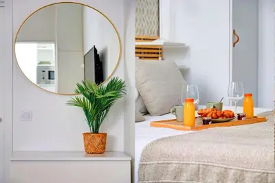 Un ou plusieurs lits dans un hébergement de l'établissement 402 Suite Netter - Superbe Studio à Paris