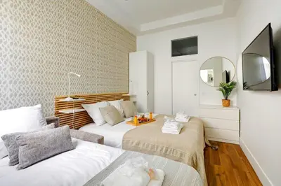 Un ou plusieurs lits dans un hébergement de l'établissement 402 Suite Netter - Superbe Studio à Paris