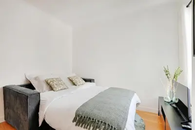 Un ou plusieurs lits dans un hébergement de l'établissement Lumineux 2 pièces Batignolles