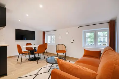Télévision ou salle de divertissement dans l'établissement Welcoming apartment -1BD-4P - 18th arrd