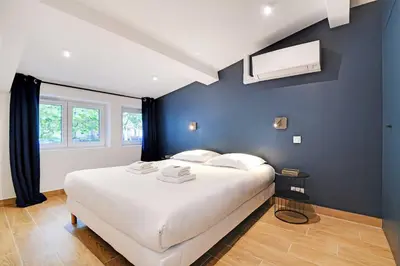 Un ou plusieurs lits dans un hébergement de l'établissement Welcoming apartment -1BD-4P - 18th arrd