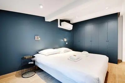 Un ou plusieurs lits dans un hébergement de l'établissement Welcoming apartment -1BD-4P - 18th arrd