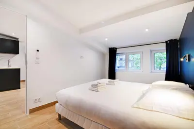 Un ou plusieurs lits dans un hébergement de l'établissement Welcoming apartment -1BD-4P - 18th arrd