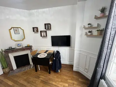 Télévision ou salle de divertissement dans l'établissement Paris pleyel