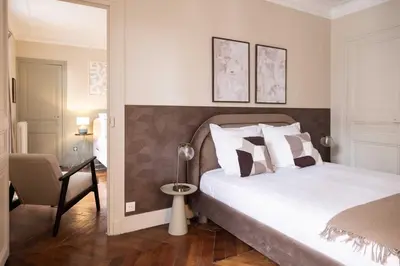 Un ou plusieurs lits dans un hébergement de l'établissement Chic apartment - 5BR-10P - Grenelle-Eiffel Tower