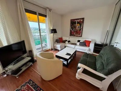 Télévision ou salle de divertissement dans l'établissement Appartement Le Boulogne