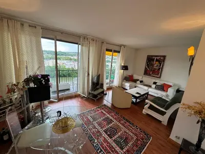 Coin salon dans l'établissement Appartement Le Boulogne