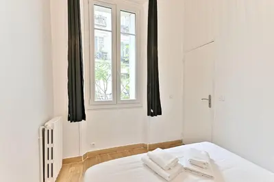 Un ou plusieurs lits dans un hébergement de l'établissement Appartement 2 chambres Pyrénées Alexandre Dumas