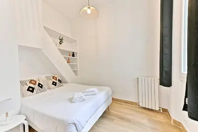 Un ou plusieurs lits dans un hébergement de l'établissement Appartement 2 chambres Pyrénées Alexandre Dumas