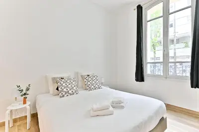 Un ou plusieurs lits dans un hébergement de l'établissement Appartement 2 chambres Pyrénées Alexandre Dumas