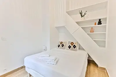Un ou plusieurs lits dans un hébergement de l'établissement Appartement 2 chambres Pyrénées Alexandre Dumas