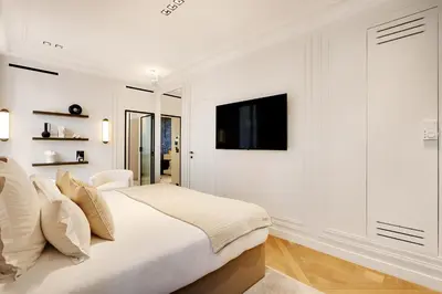 Télévision ou salle de divertissement dans l'établissement TheLander - Serviced Apartment in Le Marais