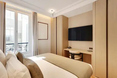 Télévision ou salle de divertissement dans l'établissement TheLander - Serviced Apartment in Le Marais
