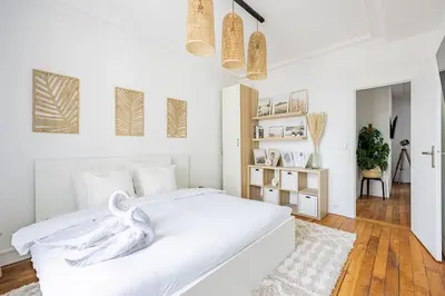 Un ou plusieurs lits dans un hébergement de l'établissement Apartment 2 Bedrooms#2 Bathrooms#Paris 14#Alesia
