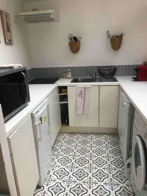 Cuisine ou kitchenette dans l'établissement Charmant appartement atypique Boulogne Billancourt