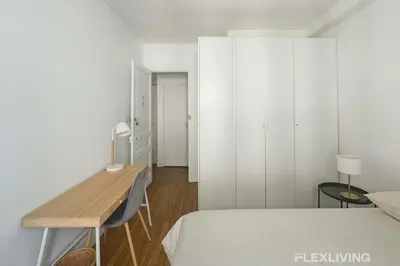 Un ou plusieurs lits dans un hébergement de l'établissement Flexliving - Room - Lamarck