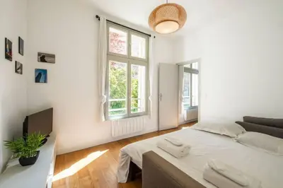 Un ou plusieurs lits dans un hébergement de l'établissement Appartement centre Levallois Proche Paris
