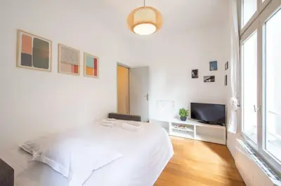 Télévision ou salle de divertissement dans l'établissement Appartement centre Levallois Proche Paris