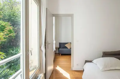 Un ou plusieurs lits dans un hébergement de l'établissement Appartement centre Levallois Proche Paris
