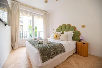 Un ou plusieurs lits dans un hébergement de l'établissement Luxury Flat Eiffel Tower View