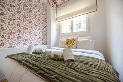 Un ou plusieurs lits dans un hébergement de l'établissement Luxury Flat Eiffel Tower View