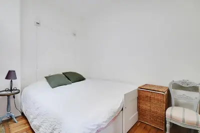 Un ou plusieurs lits dans un hébergement de l'établissement GuestReady - Modern Comfort near Montparnasse