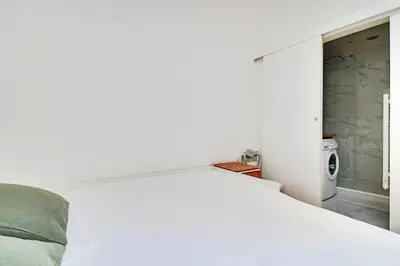 Un ou plusieurs lits dans un hébergement de l'établissement GuestReady - Modern Comfort near Montparnasse