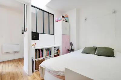 Un ou plusieurs lits dans un hébergement de l'établissement GuestReady - Modern Comfort near Montparnasse