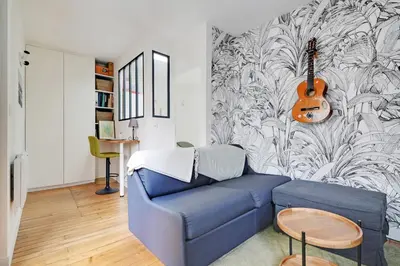 Coin salon dans l'établissement GuestReady - Modern Comfort near Montparnasse