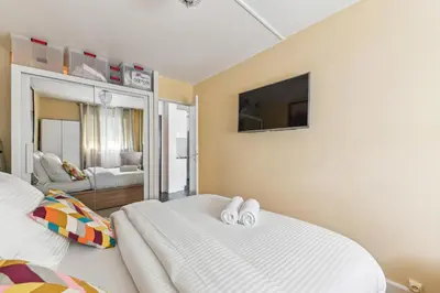 Un ou plusieurs lits dans un hébergement de l'établissement Chic and comfortable apart with balcony
