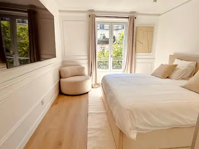 Un ou plusieurs lits dans un hébergement de l'établissement Le Penthouse Bourdonnais C
