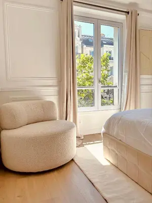 Un ou plusieurs lits dans un hébergement de l'établissement Le Penthouse Bourdonnais C