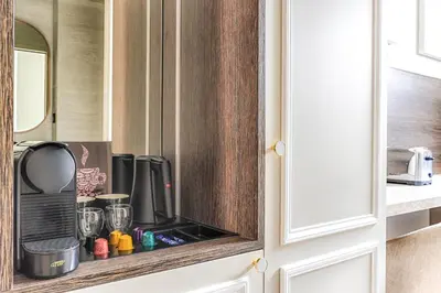 Cuisine ou kitchenette dans l'établissement Luxury and Design Studio Invalides