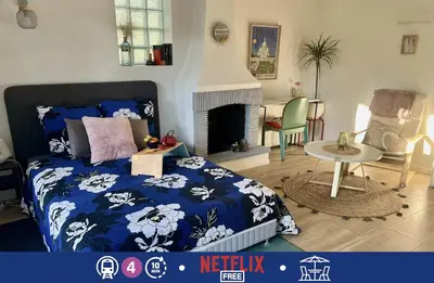 Coin salon dans l'établissement Studio avec terrasse charmante à -10mn du métro 4